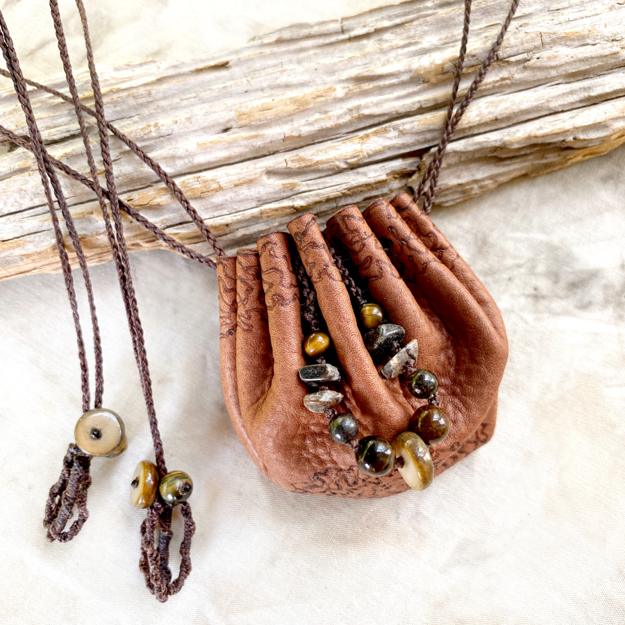 Small leather pouch necklace for carrying tiny treasures