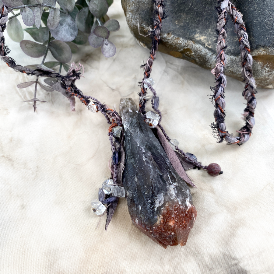 Crystal healing talisman with large, red tip Auralite 23