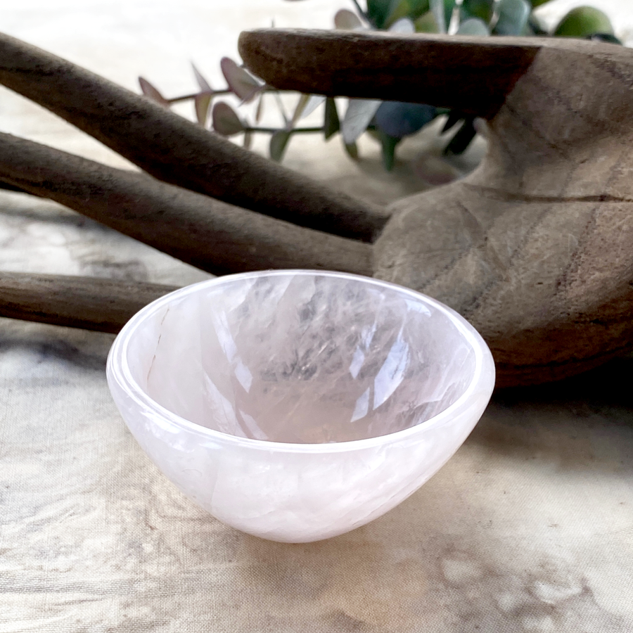 Tiny decorative crystal bowl carved from Rose Quartz