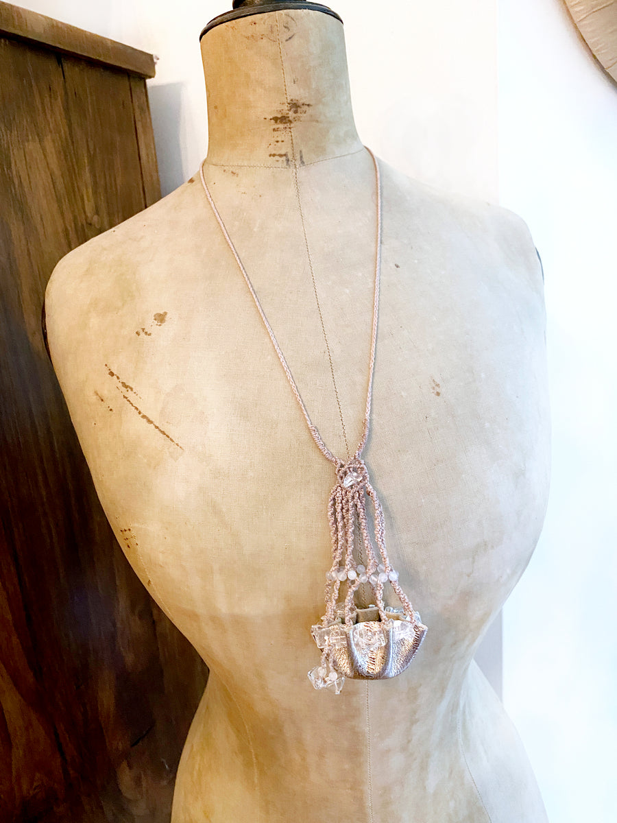 Crystal pod necklace for carrying loose crystals