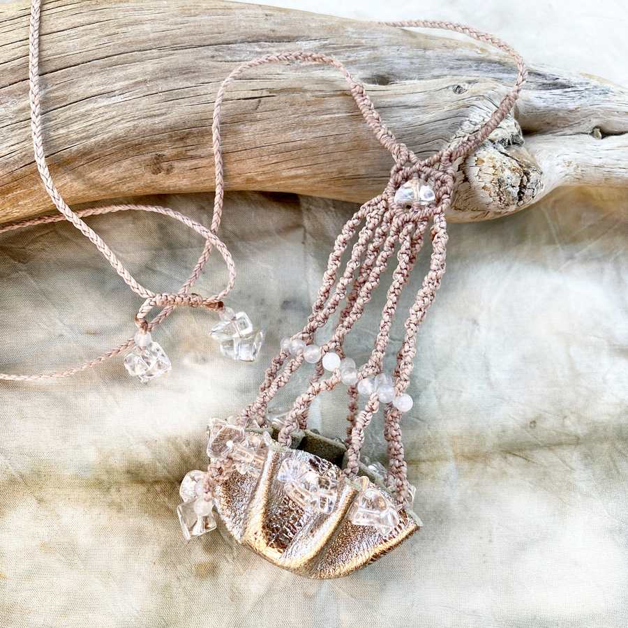 Crystal pod necklace for carrying loose crystals