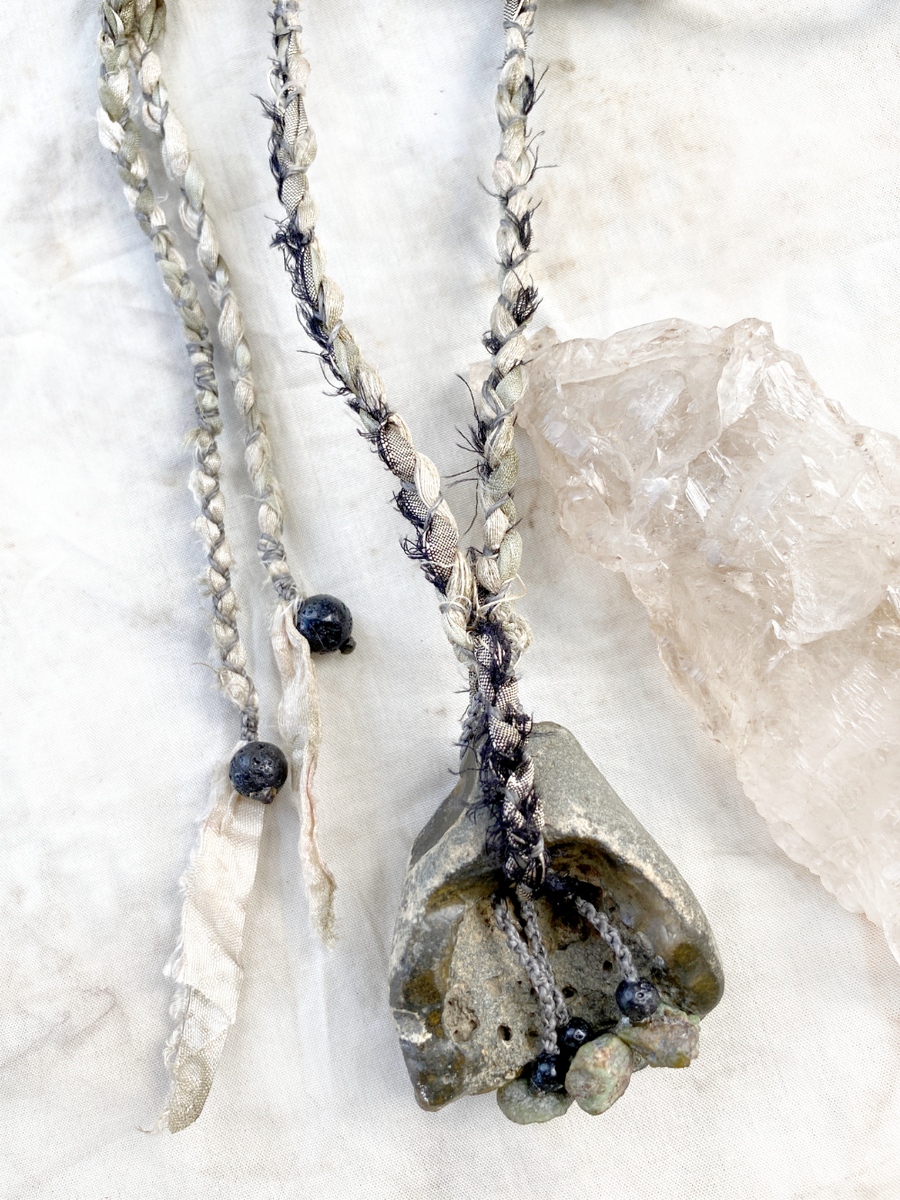 'Ancient Tides' Flint hagstone talisman with Kornerupine & Lava Stone