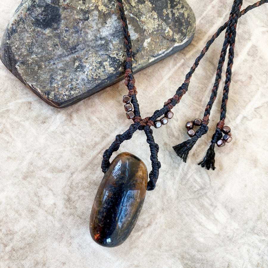 Crystal healing amulet with Chiastolite