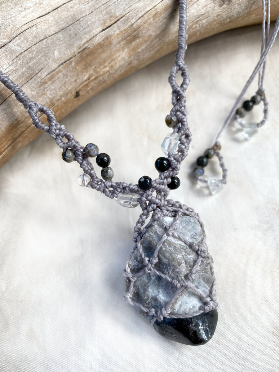 Crystal healing amulet with Apache Tear Obsidian in matrix