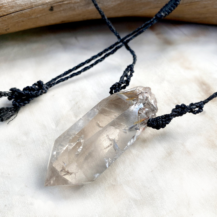 Crystal healing amulet with Rutile Quartz point