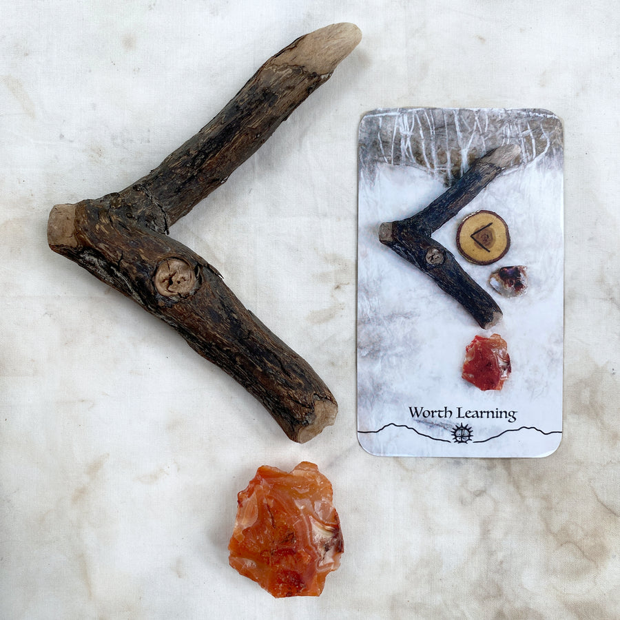 Altar elements: Carnelian pebble with a Kenaz shaped wood branch (as featured in Spirit Carrier oracle) (Copy)