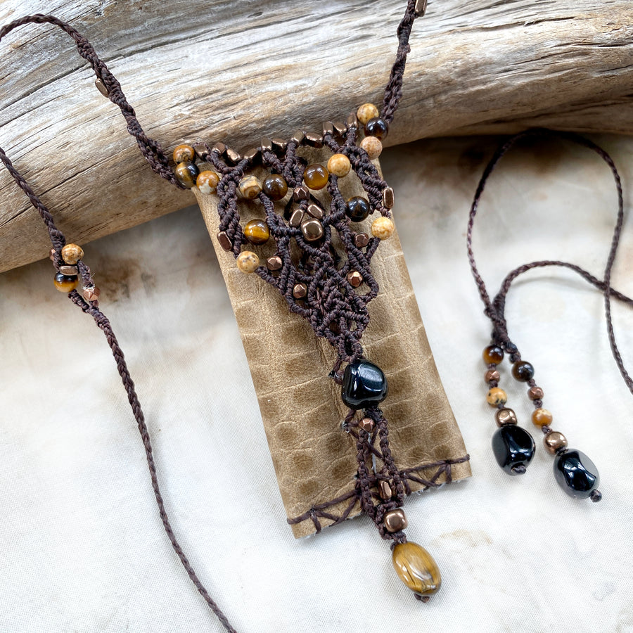 Small leather pouch necklace for carrying tiny treasures
