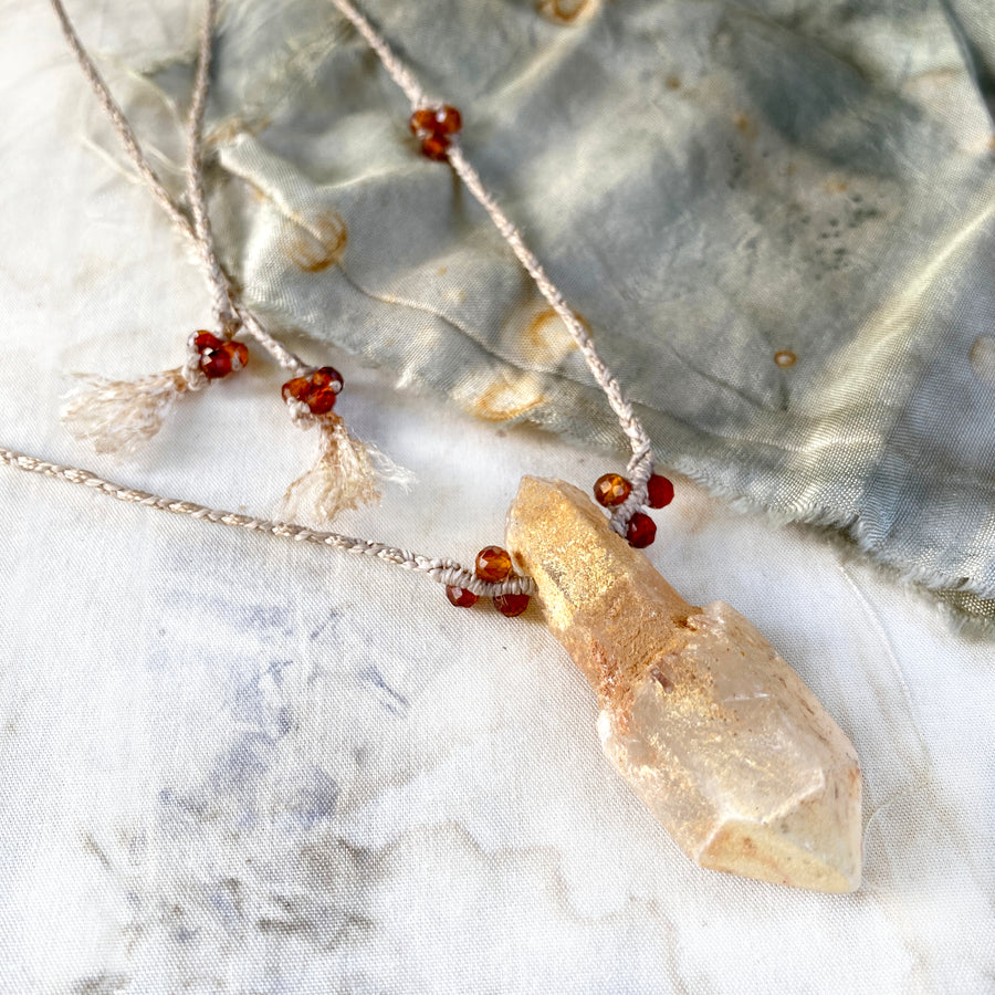 Sceptre Quartz crystal amulet with Hessonite Garnet