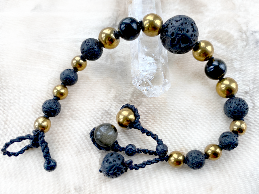 Mala bracelet with black and gold counter beads