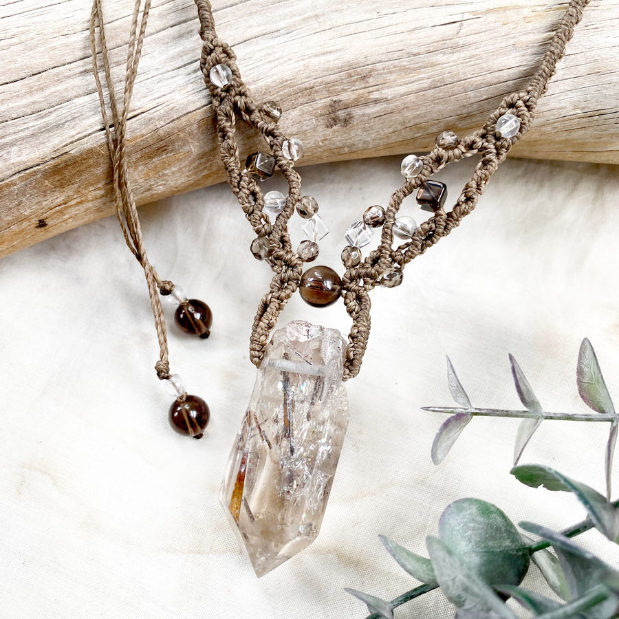 Crystal healing amulet with Rutile Quartz point