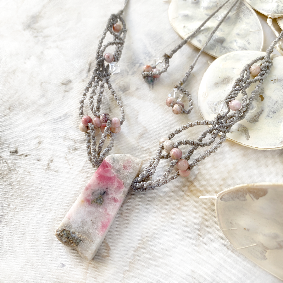 Tugtupite crystal healing amulet
