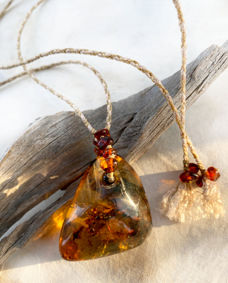 Amber crystal healing amulet