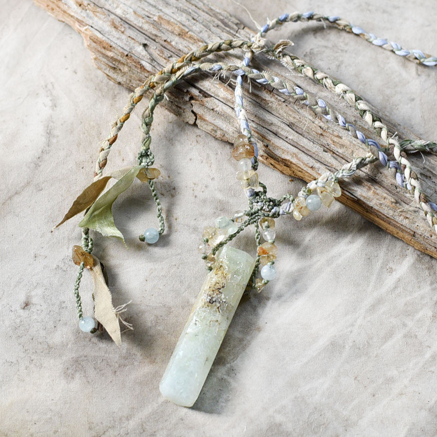Aquamarine stone talisman with Gold Rutile Quartz in silk & cotton braid