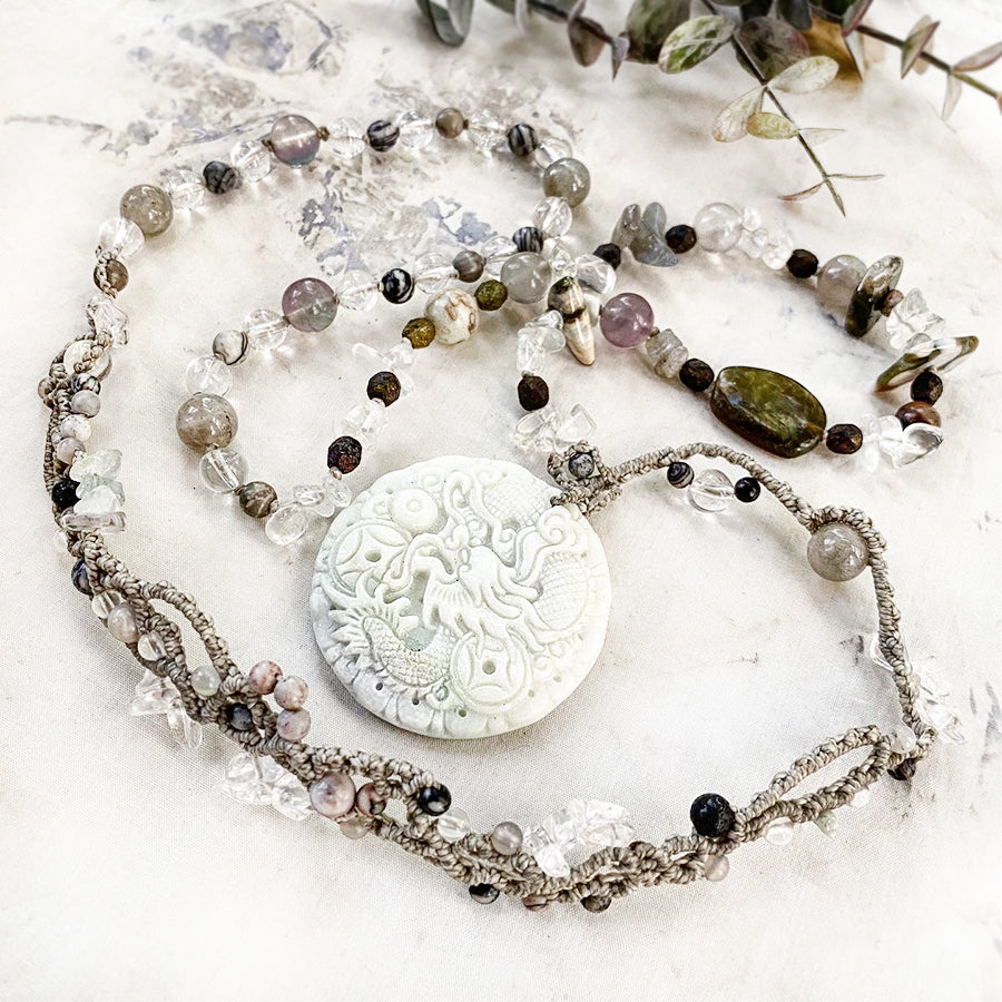 White Jade 'dragon' crystal healing amulet