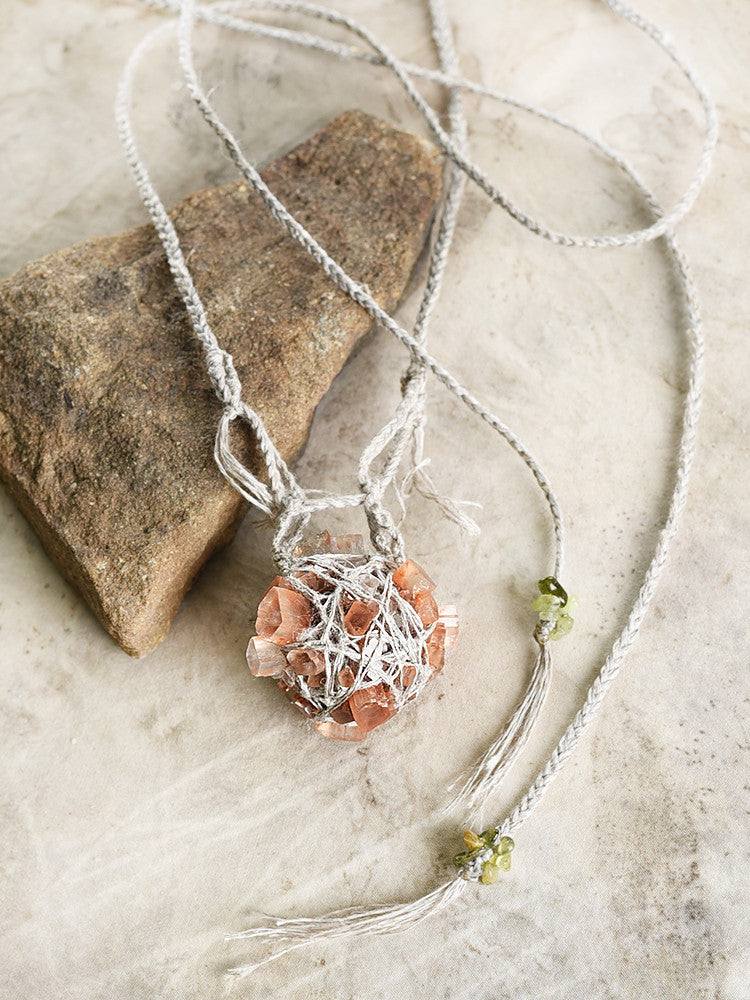 Aragonite crystal amulet with Verdelite in organic linen braid