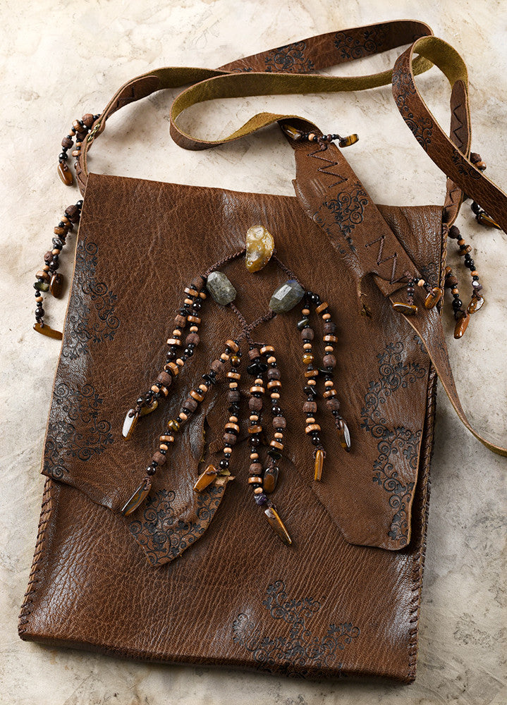 Tribal style brown leather bag, fully hand-stitched with crystal details