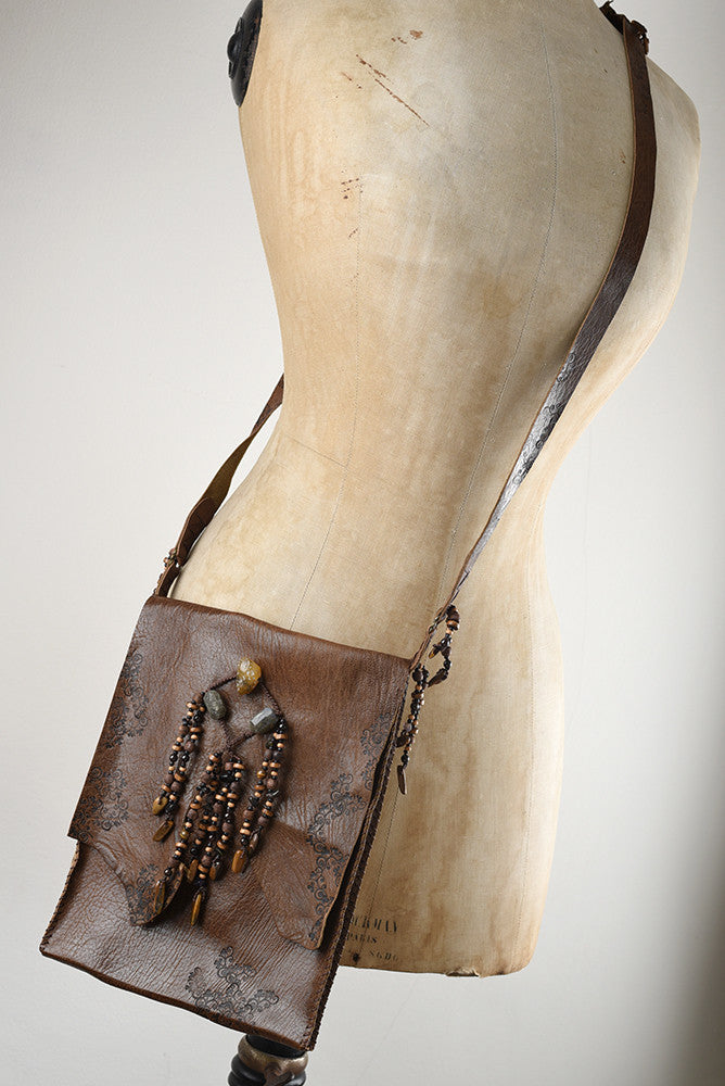 Tribal style brown leather bag, fully hand-stitched with crystal details