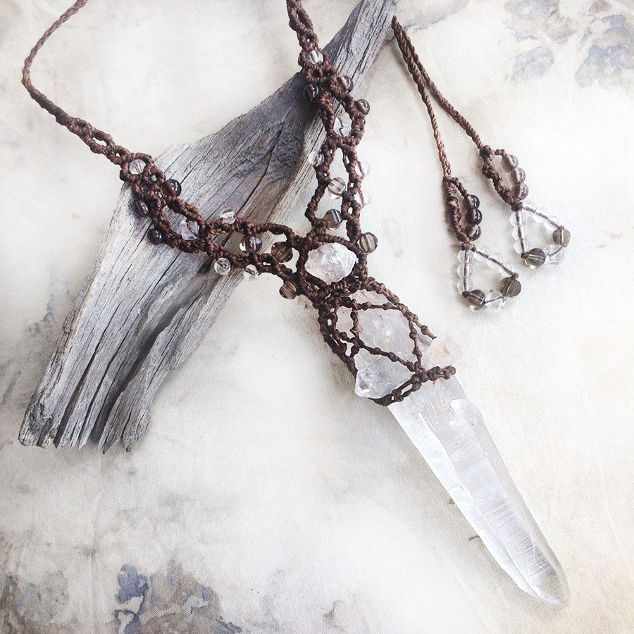 Crystal healing amulet with raw, natural Quartz laser wand