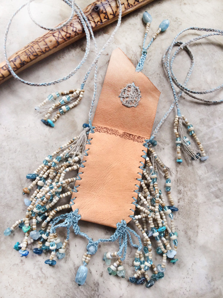 Tribal style wearable leather 'purse', fully hand-stitched with crystal details and beaded tassels