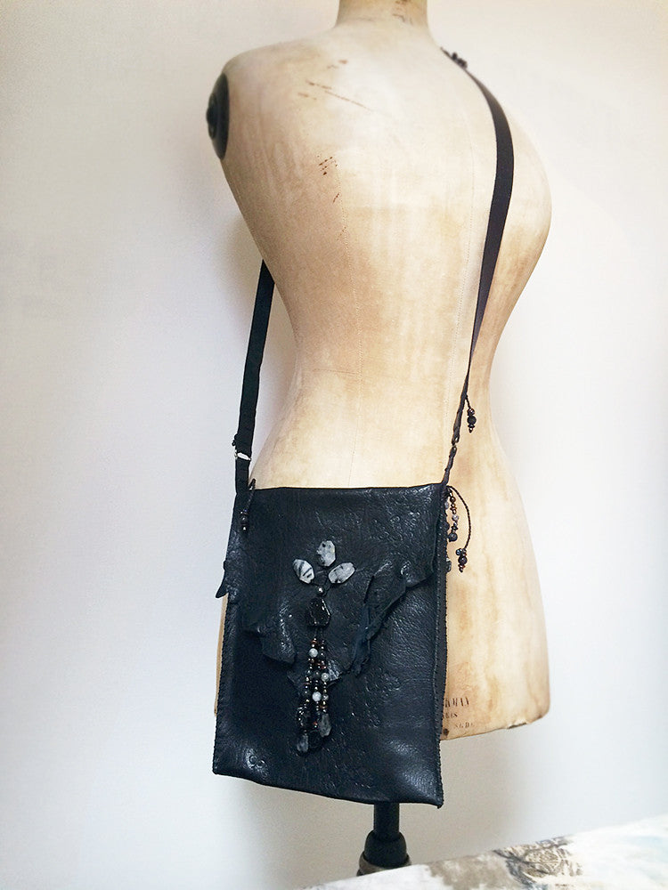 Tribal style black leather bag, fully hand-stitched with crystal details
