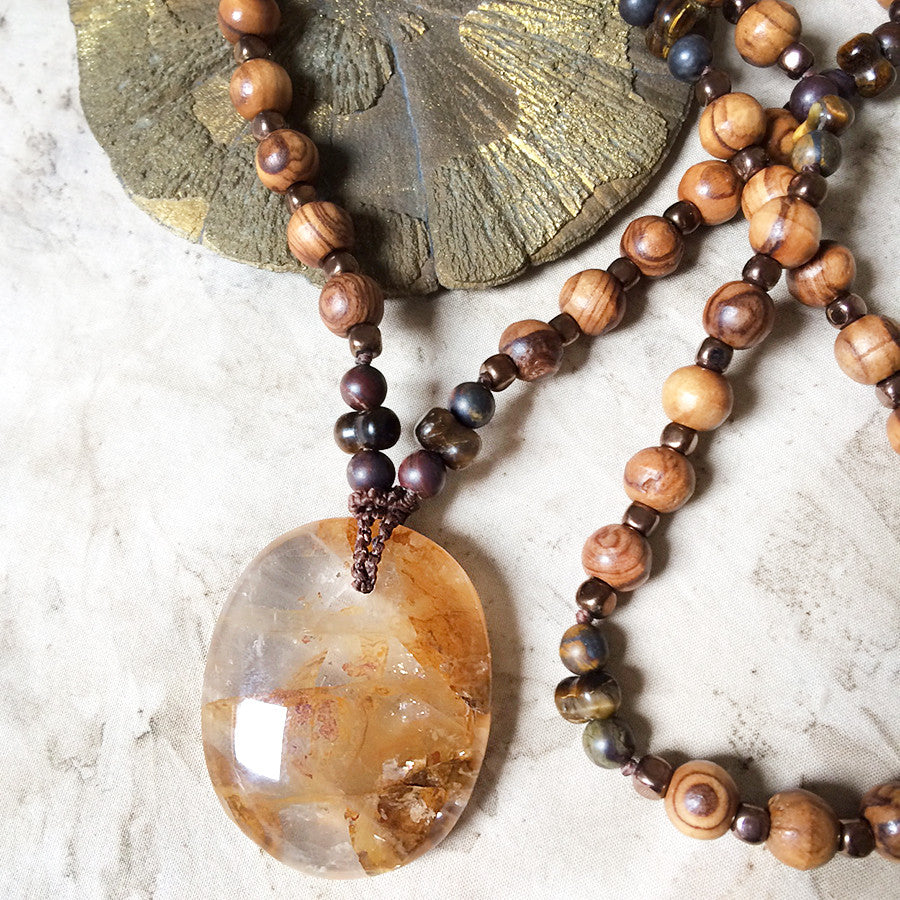 'Golden Healer' Quartz crystal amulet with Hematite, Tiger Eye, Tiger Iron & olive wood