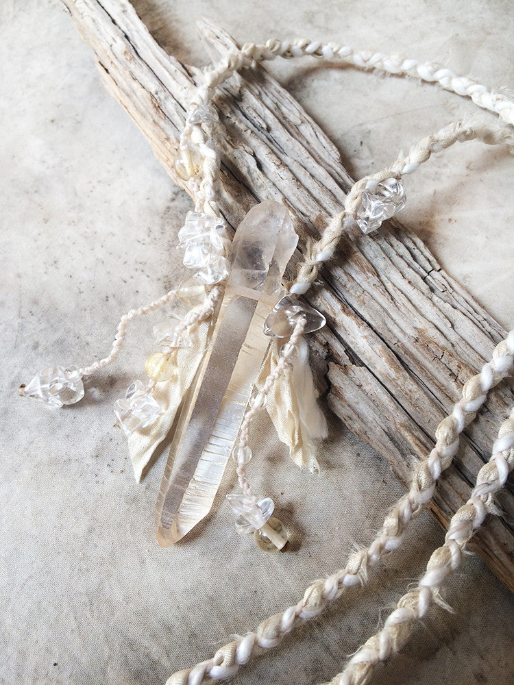 Crystal healing talisman with golden Lemurian Quartz in silk braid