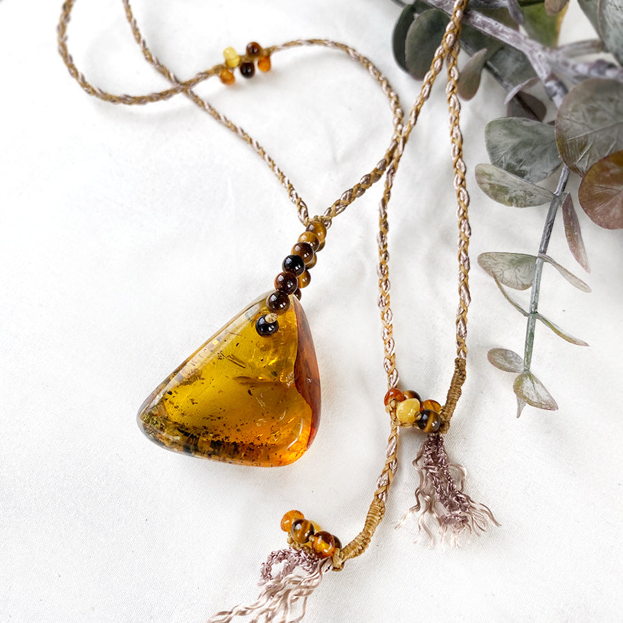 Amber crystal healing amulet
