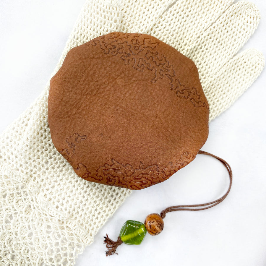Drawstring leather pouch for carrying tiny treasures