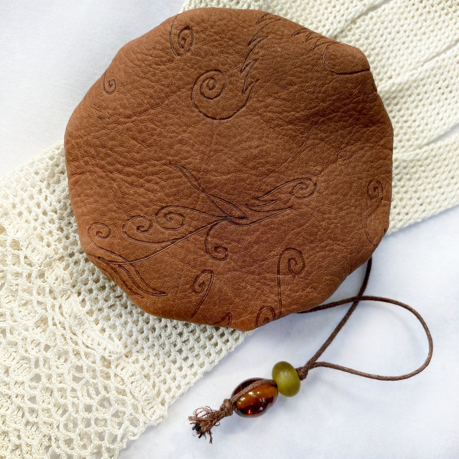 Drawstring leather pouch for carrying tiny treasures