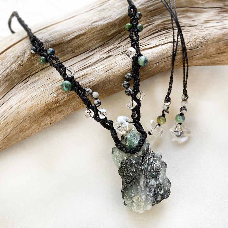 Emerald crystal healing amulet