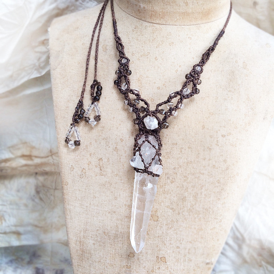 Crystal healing amulet with raw, natural Quartz laser wand