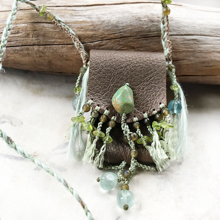 Tribal style leather pouch necklace with crystal detailing