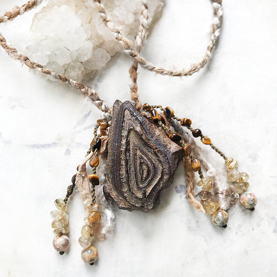 Shamanic desert stone talisman in silk braid