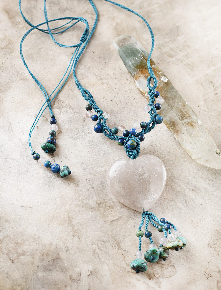 Quartz heart crystal amulet in blue tones