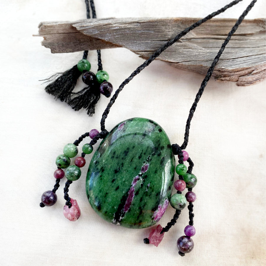 Crystal healing amulet with Ruby in Zoisite