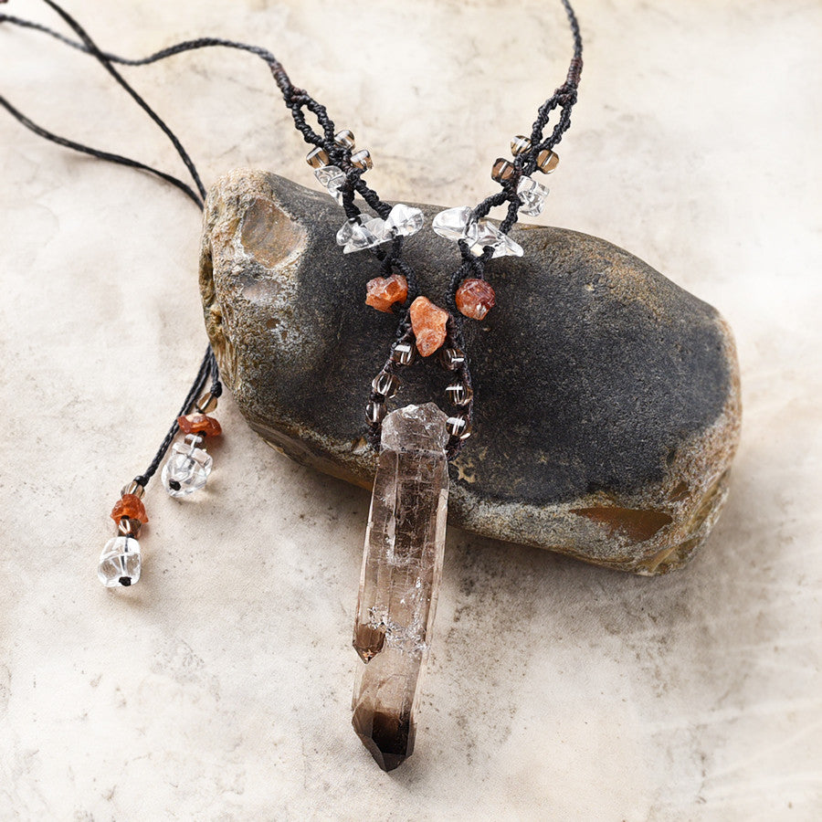 Crystal healing necklace with raw, natural Smokey Quartz dolphin point