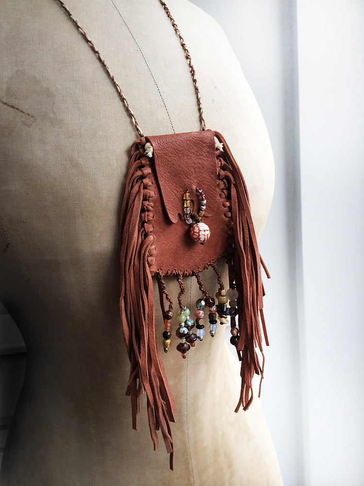 Tribal style brown leather pouch, fully hand-stitched with crystal details