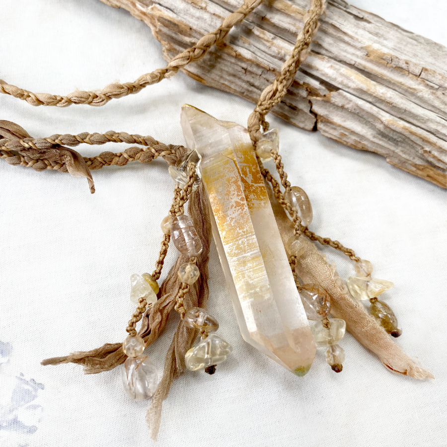 Quartz point crystal healing amulet ~ with gold leaf